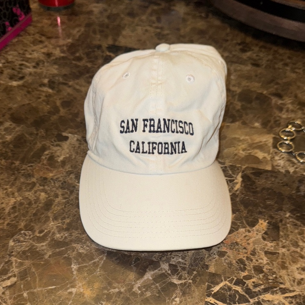 White Cap with Blue Embroidery